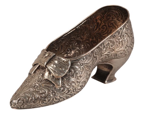 A VICTORIAN SILVER SHOE FORM VASE
