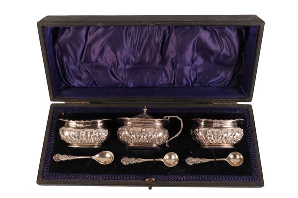 AN EDWARD VII SILVER THREE PIECE CRUET SERVICE