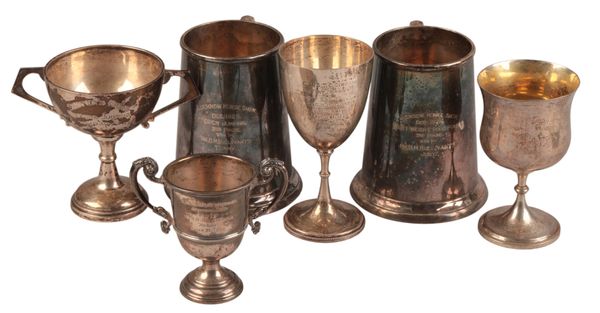 FOUR EARLY 20TH CENTURY SILVER EQUESTRIAN TROPHIES