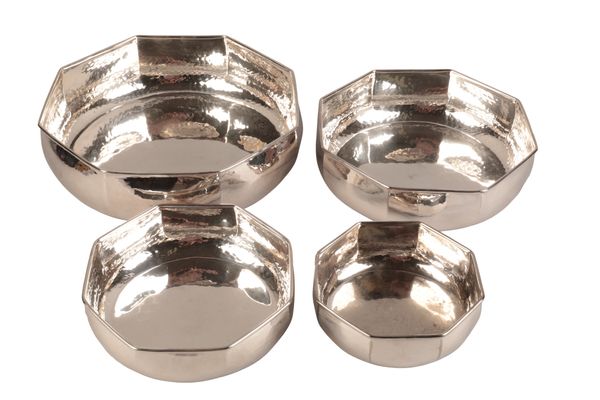A SET OF FOUR CHRISTIAN DIOR SILVER PLATED BOWLS