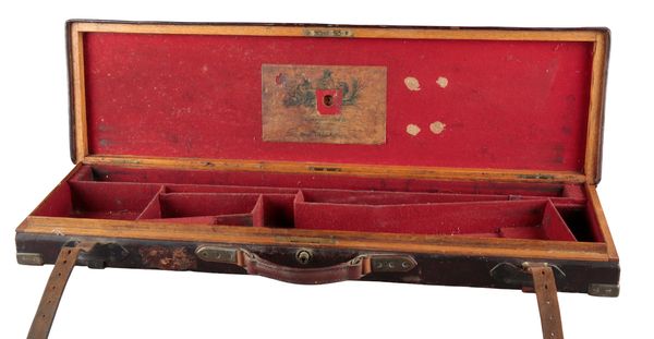 A SINGLE OAK AND LEATHER GUN CASE