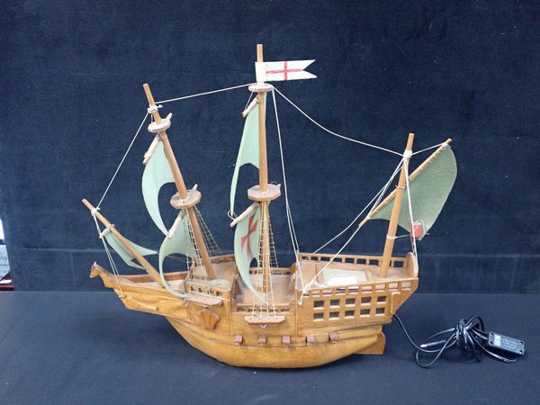 AN OAK MODEL SHIP, WITH FAUX VELLUM SAILS