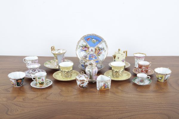 A PAIR OF AYNSLEY SILVER MOUNTED CUPS AND SAUCERS