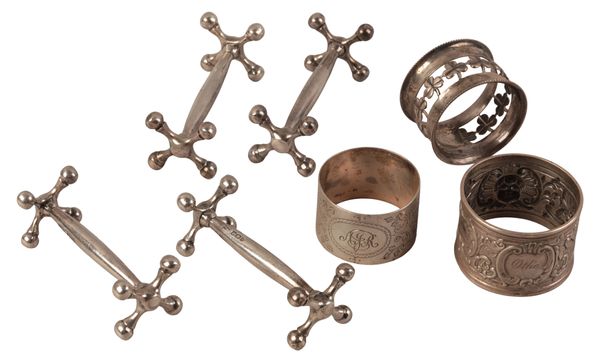 A SET OF FOUR EDWARD VII SILVER KNIFE RESTS