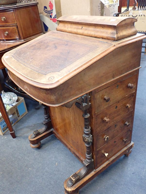 A VICTORIAN WALNUT DAVENPORT