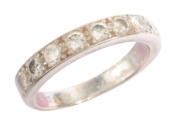 A DIAMOND HALF ETERNITY RING