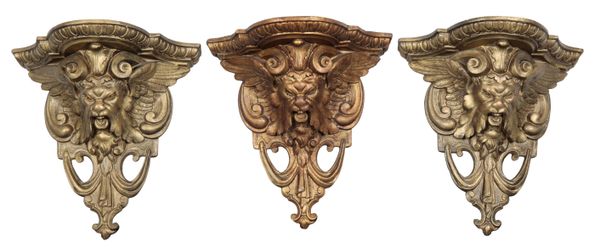 A SET OF THREE GILDED WALL BRACKETS