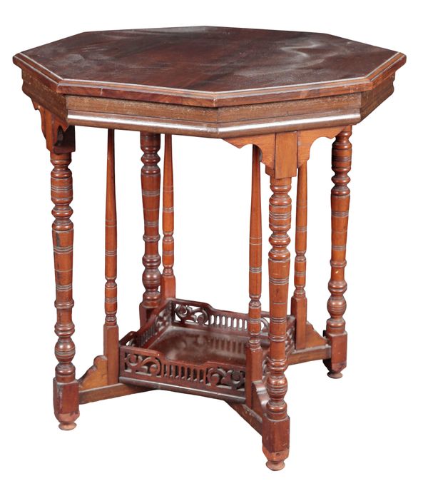 AN EDWARDIAN WALNUT OCCASIONAL TABLE IN THE MANNER OF JAMES SHOOLBRED