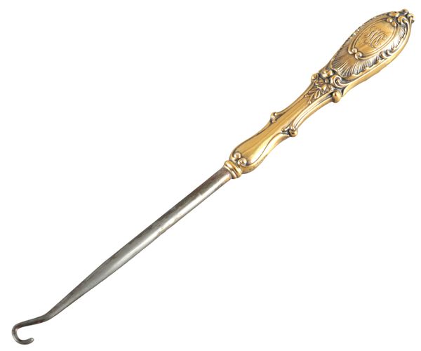 A GORHAM SILVER GILT BUTTON HOOK