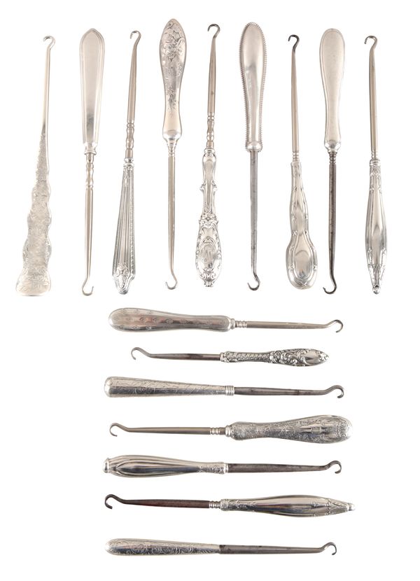 A COLLECTION OF FIFTEEN GORHAM STERLING SILVER HANDLED BUTTON HOOKS