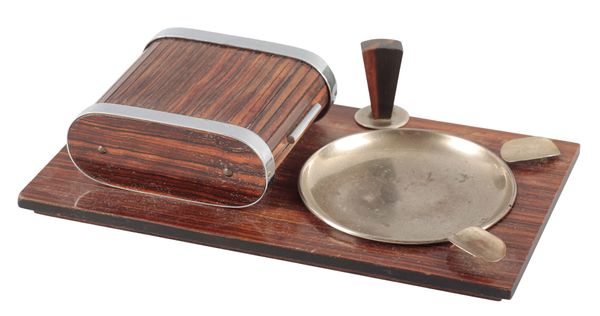 *CARL AUBÖCK (AUSTRIAN, 1900-1957) A smoking companion set