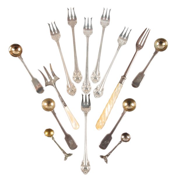 A SET OF SIX STERLING SILVER OYSTER FORKS