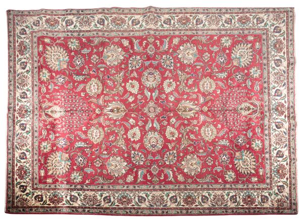 A PERSIAN TABRIZ CARPET