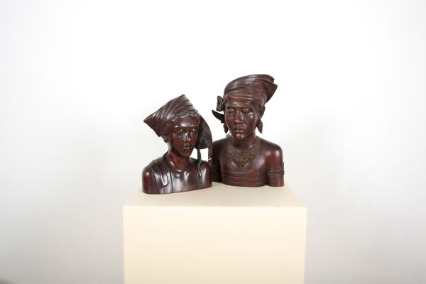 TWO HARDWOOD INDONESIAN CARVED BUSTS