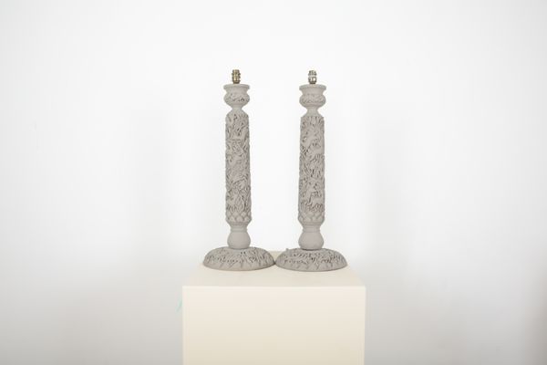 A PAIR OF CARVED GREY-PAINTED COLUMN LAMPS