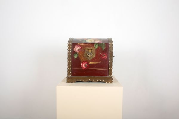 A SMALL DOMED POLYCHROME PAINTED WOOD CHEST