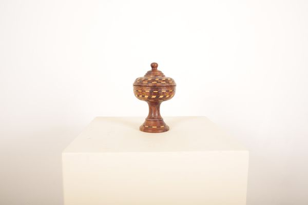 A VICTORIAN TURNED BURR WALNUT URN