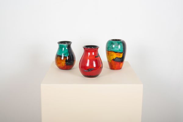 THREE POOLE POTTERY POLYCHROME VASES