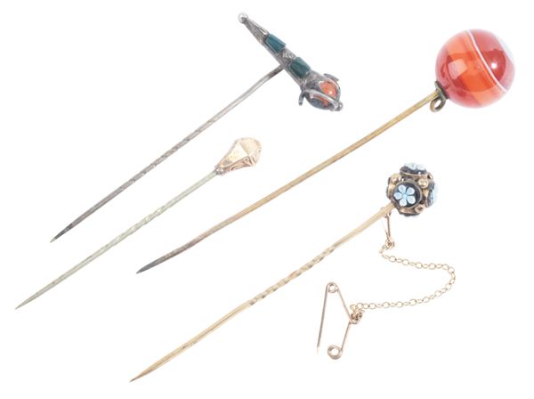 A SMALL COLLECTION OF STICK PINS