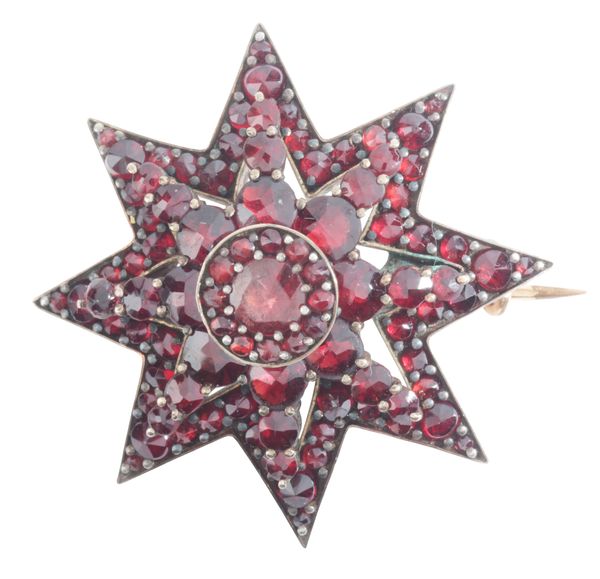 A BOHEMIAN GARNET STAR BROOCH