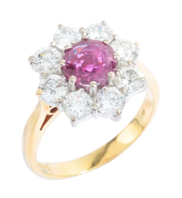 A VINTAGE RUBY AND DIAMOND CLUSTER RING