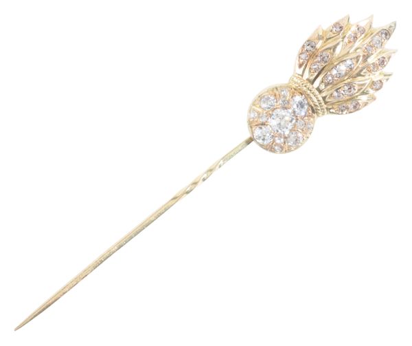 A DIAMOND FLAMING GRENADE STICK PIN