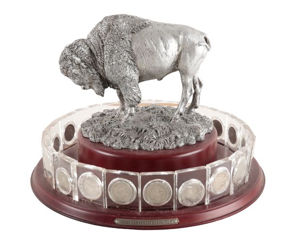 A RESIN BUFFALO CENTREPIECE