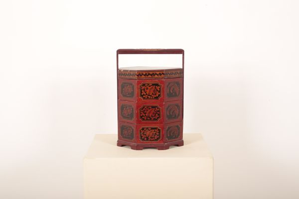 AN INDONESIAN RED LACQUERED TIFFIN BOX