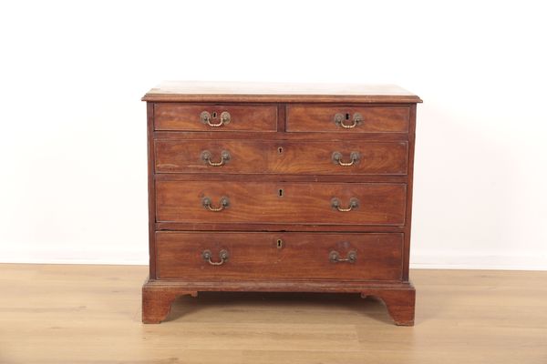 A DIMINUTIVE MAHOGANY GEORGE III CHEST OF DRAWERS