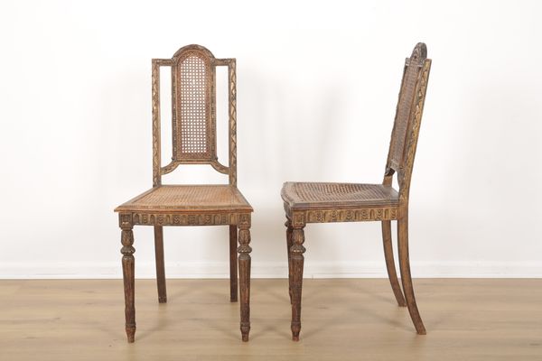 A PAIR OF PARCEL GILT AND CANED OCCASIONAL CHAIRS IN LOUIS XVI STYLE