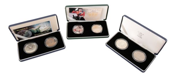 THE ROYAL MINT: A 2002 QUEEN ELIZABETH II JUBILEE SILVER PROOF CROWN SET