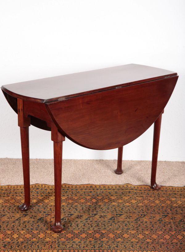 A GEORGE II MAHOGANY DROP-LEAF SUPPER TABLE