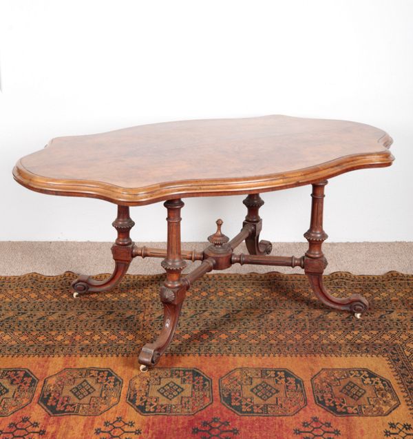 A VICTORIAN WALNUT AND BURR WALNUT CENTRE TABLE