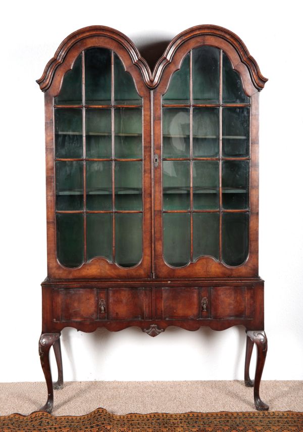 A QUEEN ANNE STYLE WALNUT CABINET