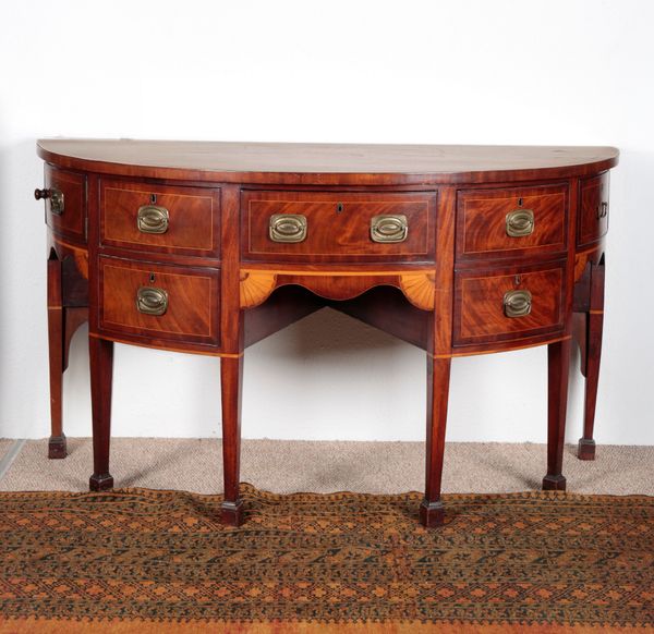 A GEORGE III MAHOGANY SIDEBOARD IN SHERATON STYLE