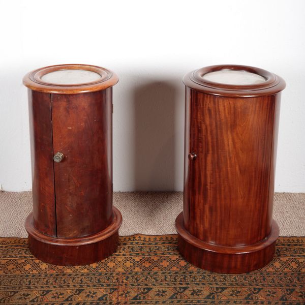 A NEAR PAIR OF VICTORIAN WALNUT BEDSIDE CUPBOARDS