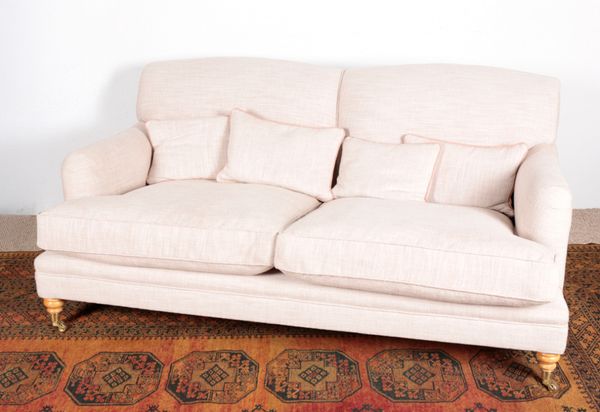 A HOWARD TYPE TWO-SEATER SOFA