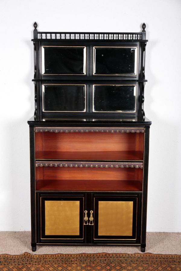 AN AESTHETIC EBONISED AND PARCEL GILT CABINET