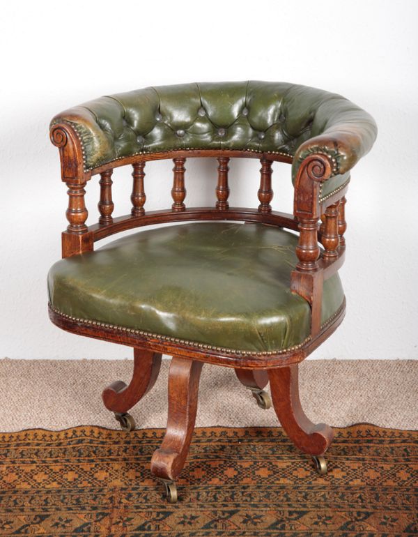 A VICTORIAN OAK DESK CHAIR