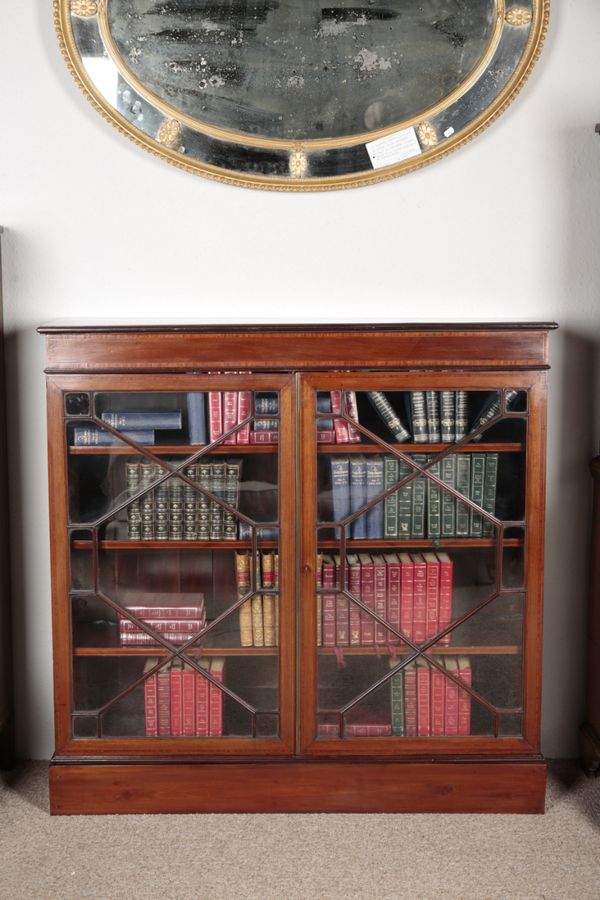 AN EDWARDIAN MAHOGANY BOOKCASE