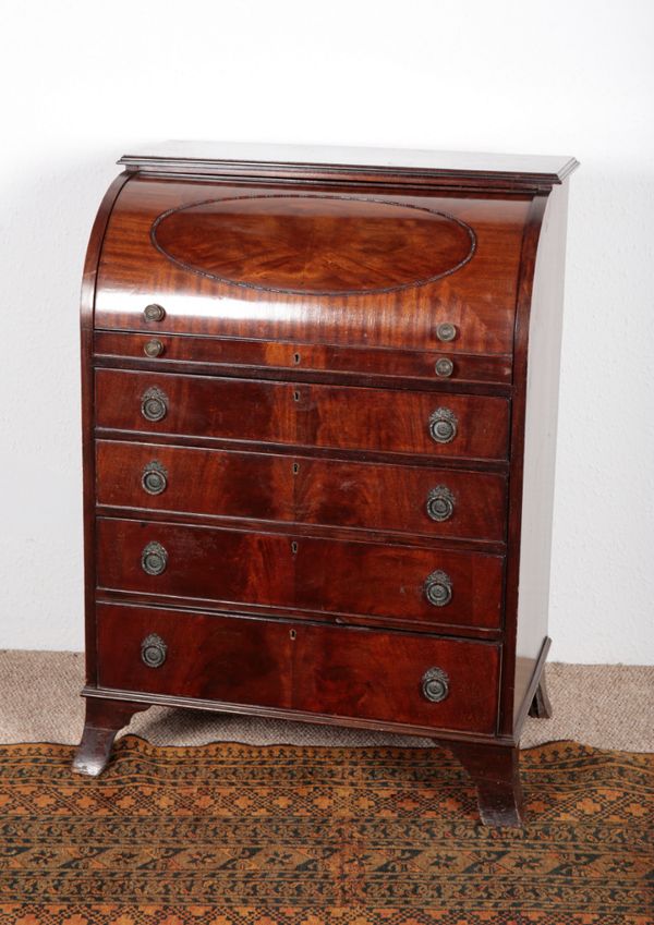 AN EDWARDIAN MAHOGANY CYLINDER BUREAU