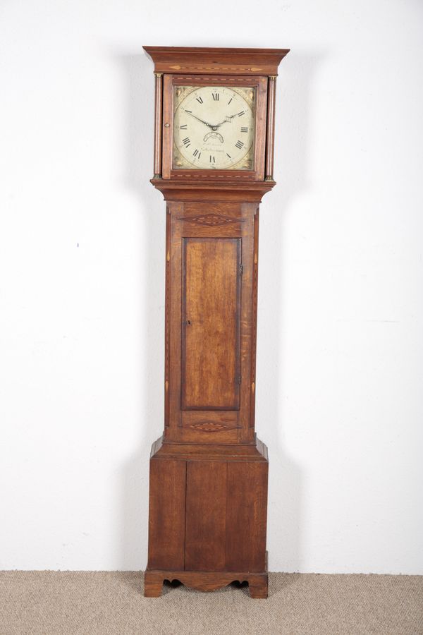 AN OAK CROSSBANDED LONGCASE CLOCK