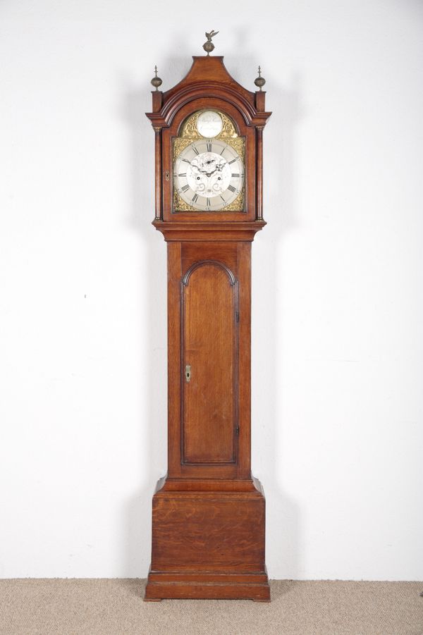 AN OAK LONGCASE CLOCK