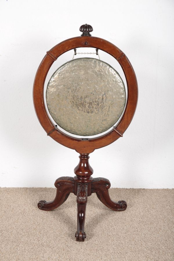 A 19TH CENTURY OAK AND BRASS DINNER GONG