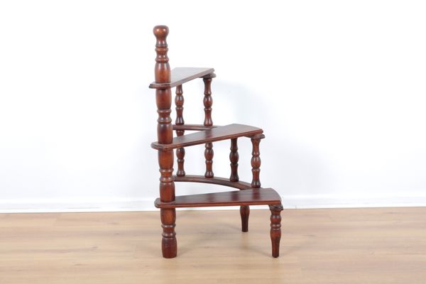A SET OF MAHOGANY THREE TIER LIBRARY STEPS