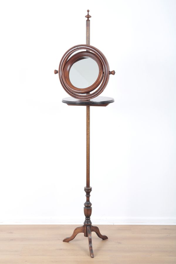 A MAHOGANY FLOOR STANDING SHAVING STAND