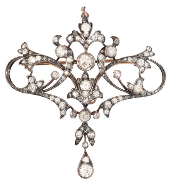 AN ANTIQUE EDWARDIAN DIAMOND BROOCH / PENDANT