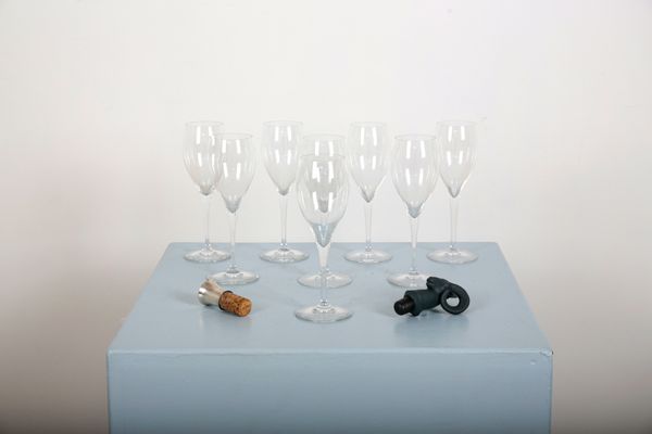 A SET OF EIGHT BACCARAT TULIP SHAPED WINE GLASSES