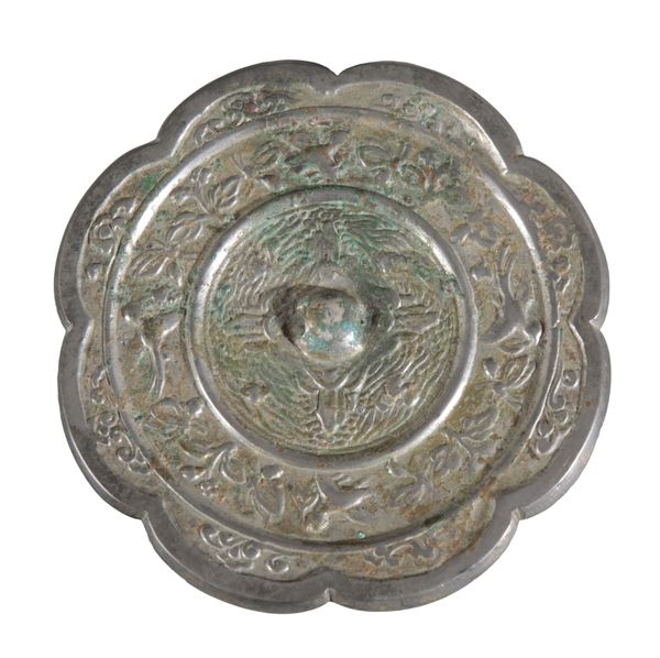 A CHINESE BRONZE MIRROR