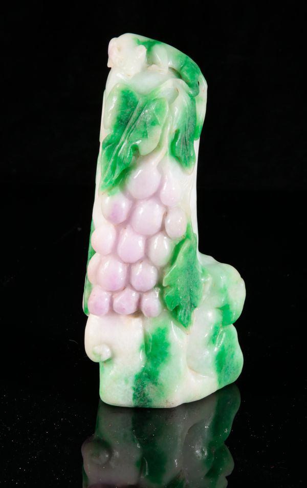 A CHINESE CARVED JADE 'SQUIRREL AND GRAPES' MOUNTAIN